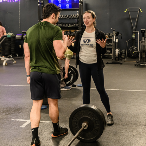 Coach Molly with a CrossFit Athlete